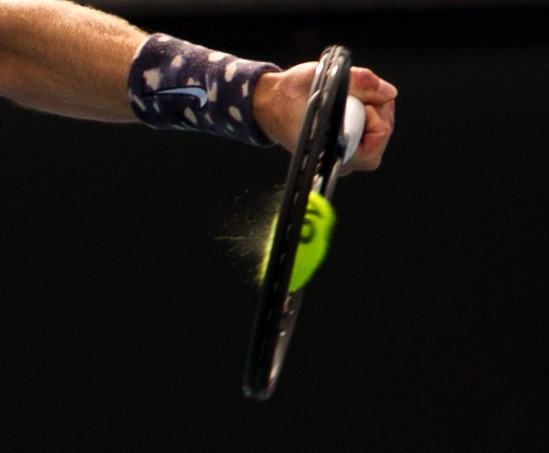 Close up of squashed tennis ball. Sports photographer Sally Jacob.